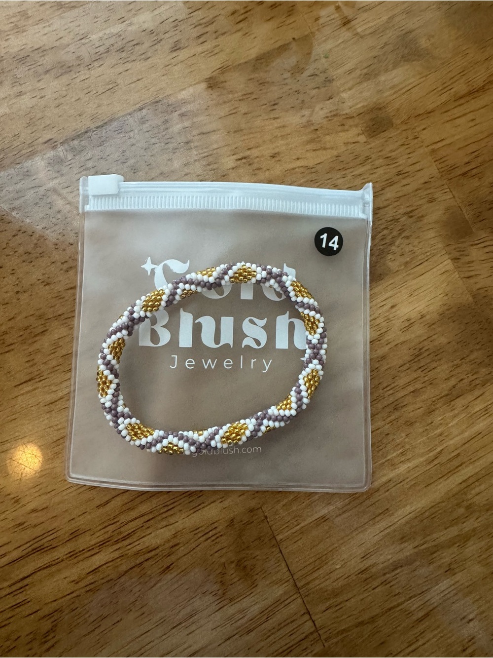 *BRAND NEW IN PACKAGE* Gold Blush Nepal bracelet